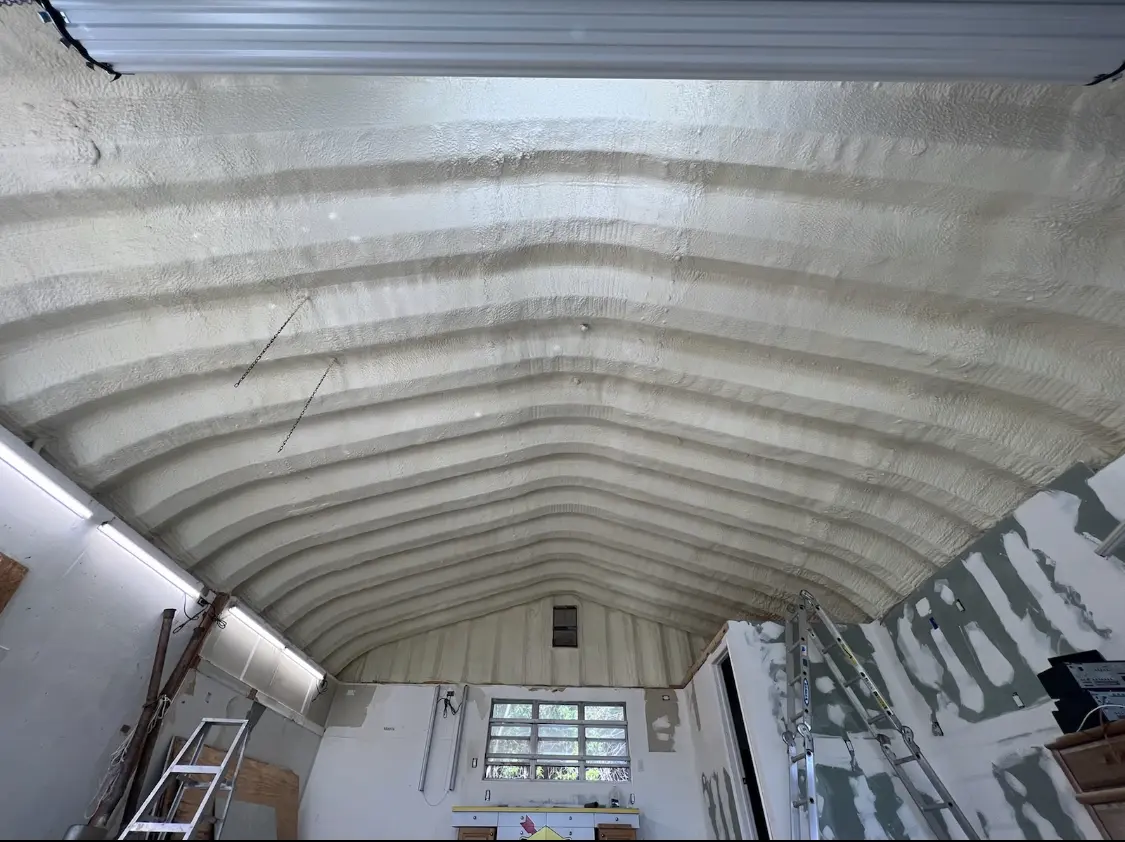Spray polyurethane foam applied to the underside of a metal roof deck in McMinnville